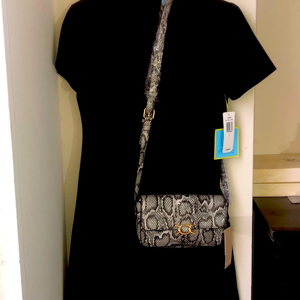 Women's Black Short-Sleeve Bow Neck Dress and a crossbody bag. - Picture 2 of 5